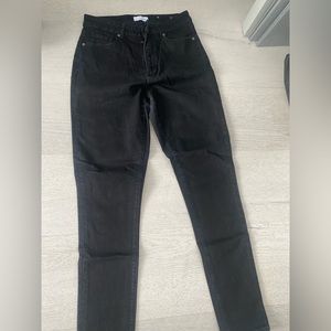 Black stretchy jeans in size 29/8- curve fit. Brand is LOFT.